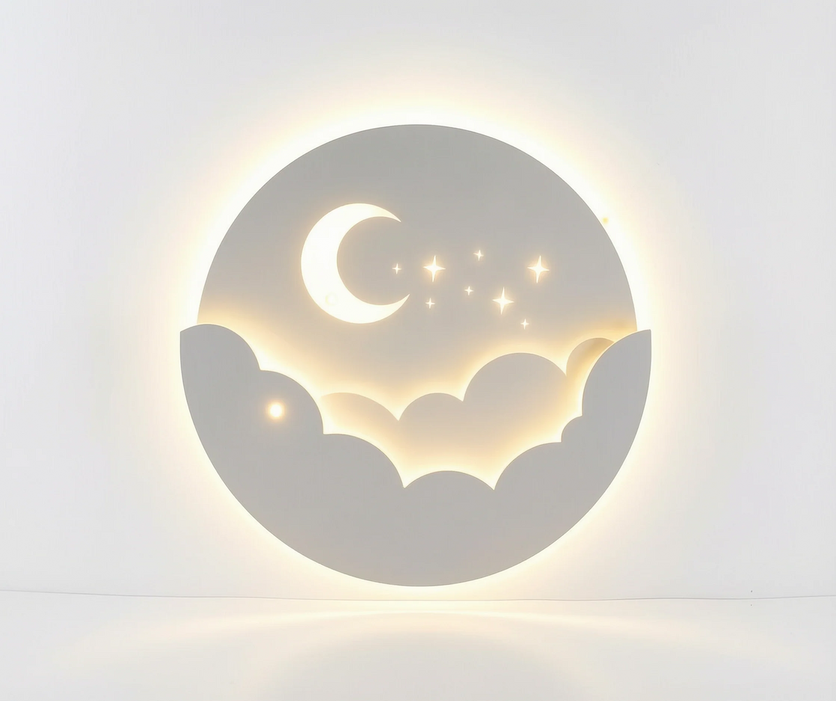 Applique murale Songe en forme de nuage et lune, allumée au-dessus d'un lit d'enfant